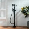 WOODBRIDGE F0048MB Fusion Single Handle Floor Mount Freestanding Tub Filler Faucet With Telephone Hand Shower In Matte Black Finish -Woodbridgebath Shop 20230314145258W5OMVZV1 thumb 600x600
