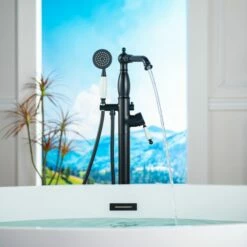 WOODBRIDGE F0048MB Fusion Single Handle Floor Mount Freestanding Tub Filler Faucet With Telephone Hand Shower In Matte Black Finish -Woodbridgebath Shop 20230314145324W5OMVZV1 thumb 600x600