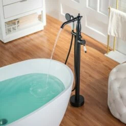 WOODBRIDGE F0048MB Fusion Single Handle Floor Mount Freestanding Tub Filler Faucet With Telephone Hand Shower In Matte Black Finish -Woodbridgebath Shop 20230314145338W5OMVZV1 thumb 600x600