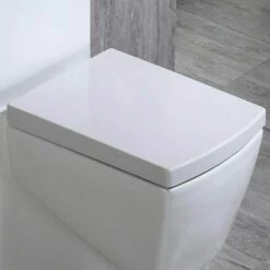 WOODBRIDGE T-0020 Dual Flush Elongated One Piece Toilet , Chair Height With Soft Closing Seat, Deluxe Square Design -Woodbridgebath Shop 5b73c43f57ae6 thumb 600x600