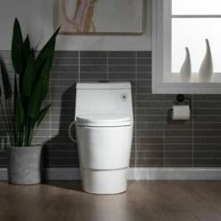 WOODBRIDGE T-0042 One Piece 1.1GPF/1.6 GPF Dual Flush Elongated Toilet With Non-Electric Toilet Seat In White -Woodbridgebath Shop 5f6d4d380e3a9 thumb 600x600