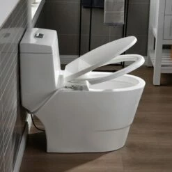 WOODBRIDGE T-0042 One Piece 1.1GPF/1.6 GPF Dual Flush Elongated Toilet With Non-Electric Toilet Seat In White -Woodbridgebath Shop 5f6d4d3f92874 thumb 600x600