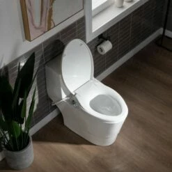 WOODBRIDGE T-0042 One Piece 1.1GPF/1.6 GPF Dual Flush Elongated Toilet With Non-Electric Toilet Seat In White -Woodbridgebath Shop 5f6d4d3ff1464 thumb 600x600