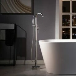 WOODBRIDGE F0024CHVT Fusion Single Handle Floor Mount Freestanding Tub Filler Faucet With Telephone Hand Shower In Polished Chrome Finish.