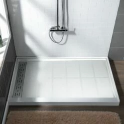WOODBRIDGE SBR4832-1000L Solid Surface Shower Base With Recessed Trench Side Including Stainless Steel Linear Cover, 48" L X 32" W X 4" H,Left Drain White Color