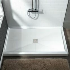 WOODBRIDGE SBR4836-1000C Solid Surface Shower Base With Recessed Trench Side Including Stainless Steel Linear Cover, 48" L X 36" W X4 H,Center Drain White Color