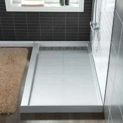 WOODBRIDGE SBR6034-1000L Solid Surface Shower Base With Recessed Trench Side Including Stainless Steel Linear Cover, 60" L X 34" W X 4" H, Left Drain, White Color -Woodbridgebath Shop 61dfc77fea78b thumb 600x600