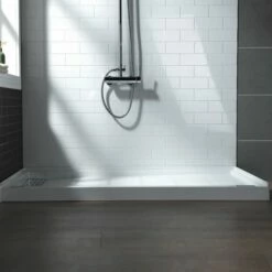 WOODBRIDGE SBR6034-1000L Solid Surface Shower Base With Recessed Trench Side Including Stainless Steel Linear Cover, 60" L X 34" W X 4" H, Left Drain, White Color -Woodbridgebath Shop 61dfc79251892 thumb 600x600