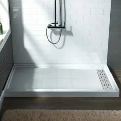 WOODBRIDGE SBR6034-1000R Solid Surface Shower Base With Recessed Trench Side Including Stainless Steel Linear Cover, 60" L X 34" W X 4" H, Right Drain, White Color -Woodbridgebath Shop 61dfc8ea13e41 thumb 600x600