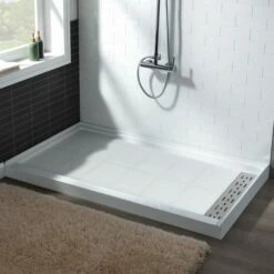 Best Seller WOODBRIDGE SBR6036-1000R Solid Surface Shower Base With Recessed Trench Side Including Stainless Steel Linear Cover, 60" L X 36" W X 4" H,Right Drain White Color -Woodbridgebath Shop 61dfcc49ab3f5 thumb 600x600