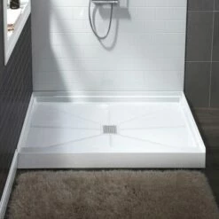 WOODBRIDGE SBR3636-1000C Solid Surface Shower Base With Recessed Trench Side Including Stainless Steel Linear Cover, 36" L X 36" W X 4" H,Center Drain White Color -Woodbridgebath Shop 621738fee69e5 thumb 600x600